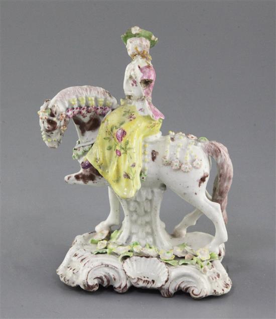 An extremely rare Girl-on-a-Horse or Compass Marked group of a young lady riding a piebald horse, c.1755, h. 15cm, losses and repairs,